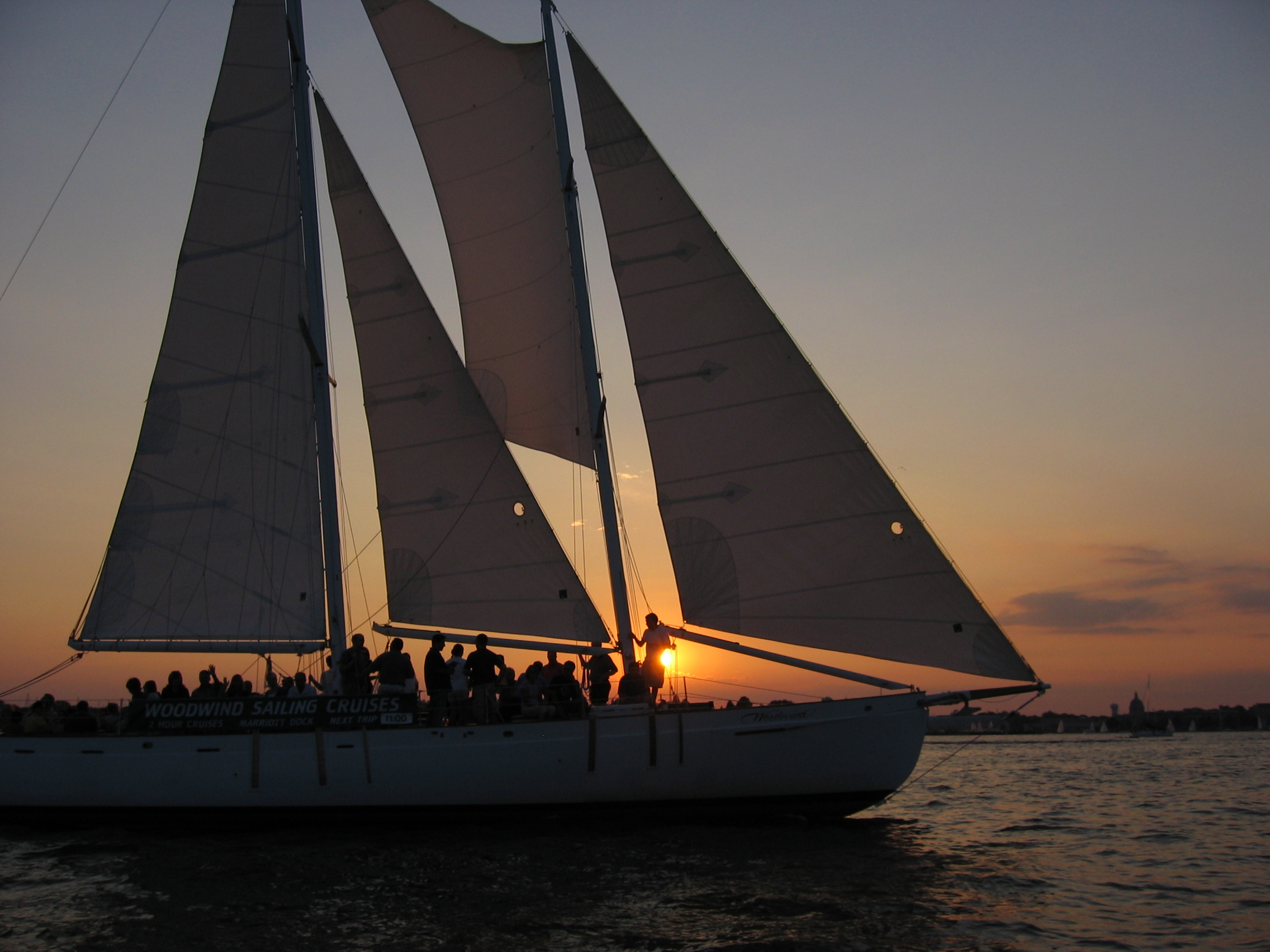 Schooner Woodwind sailing into the sunset