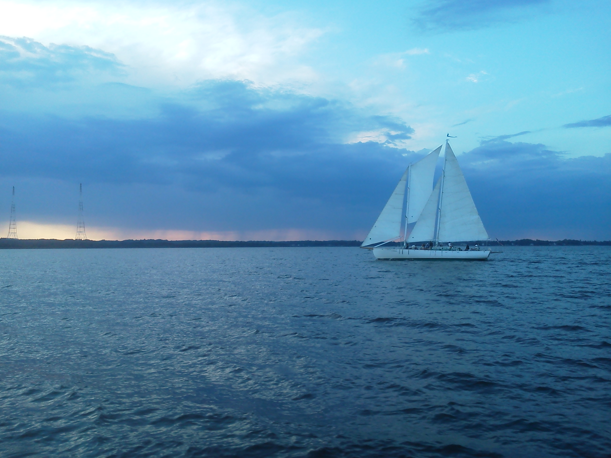 Schooner Woodwind II sailing into the sunset