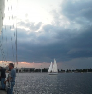 Schooner Woodwind II sailing along USNA sea wall 