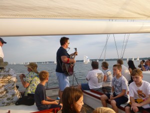 Sean Tracy singing on the Local Singer/Songwriter Cruise on Schooner Woodwind