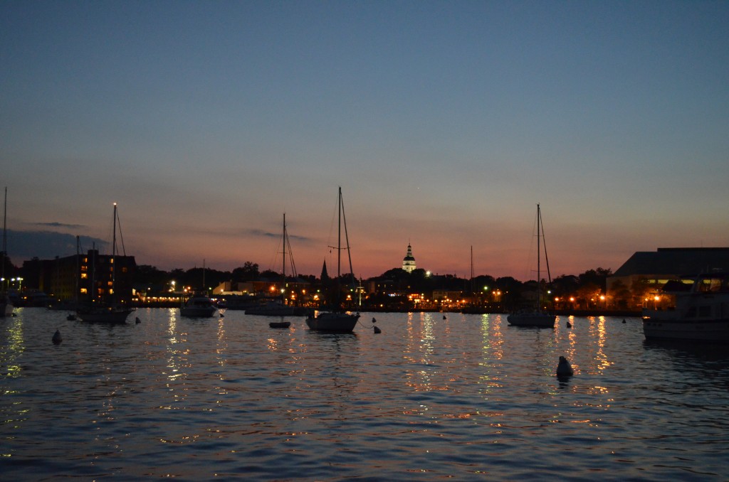 The Harbor at dusk with all of the lights and moored boats