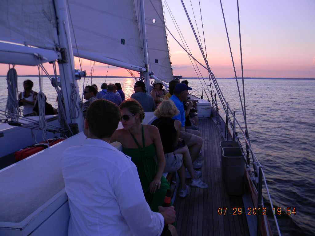 Guests enjoying a beautiful sunset and cruise on the schooner
