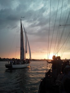Great photo as Woodwind II passes us at sunset in Annapolis