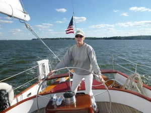 Sandra at the wheel of Schooner Woodwind