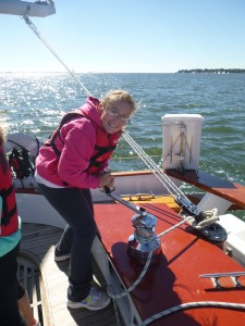 Girl Scouts learning to use the winch on the schooner 