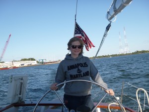 Lauren at the wheel of Schooner Woodwind