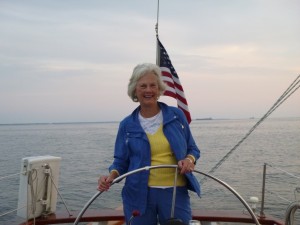 Marjorie Ackerman at the Wheel of Schooner Woodwind