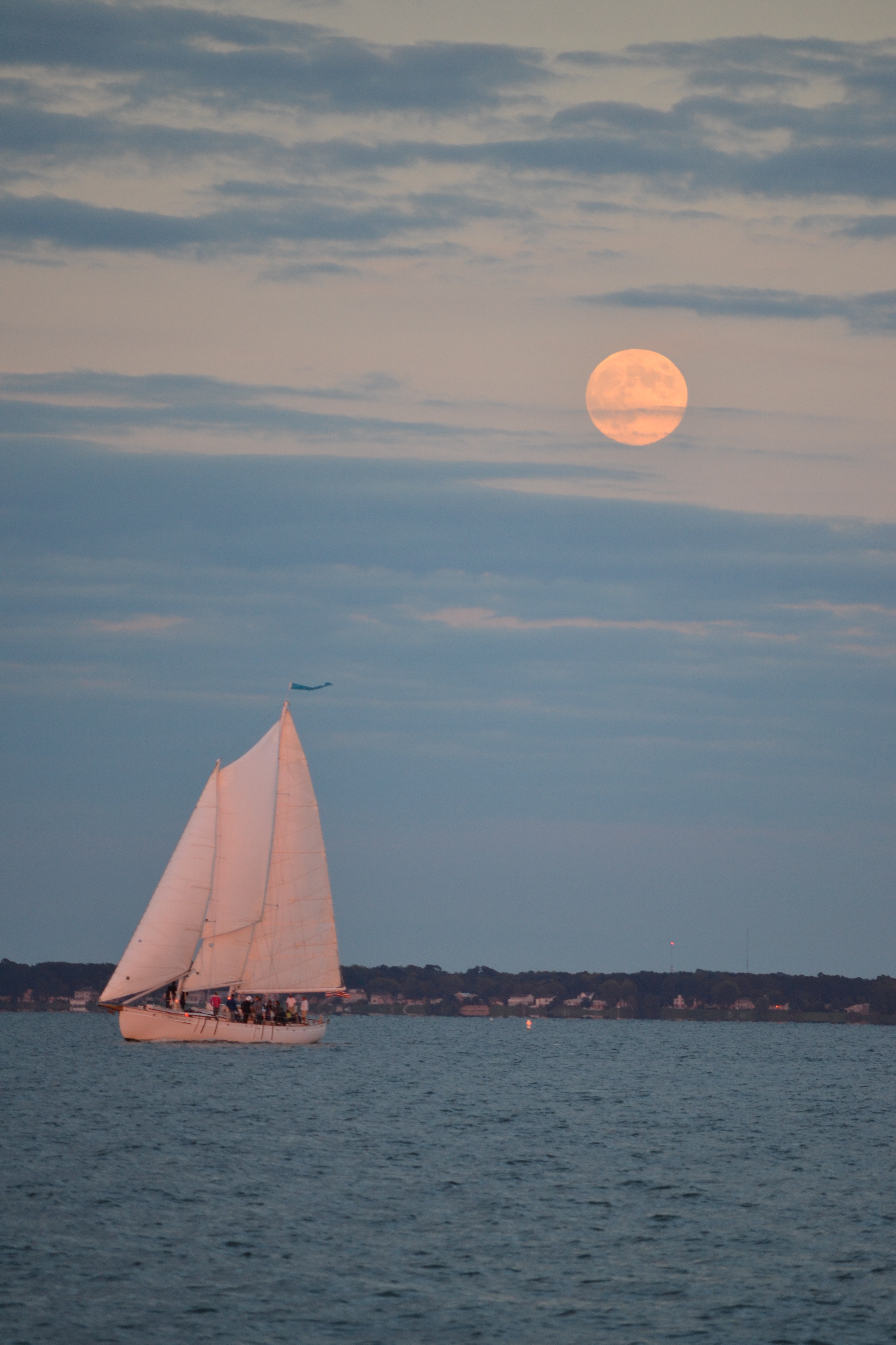 Full Moon rising over the schooner on the Bay