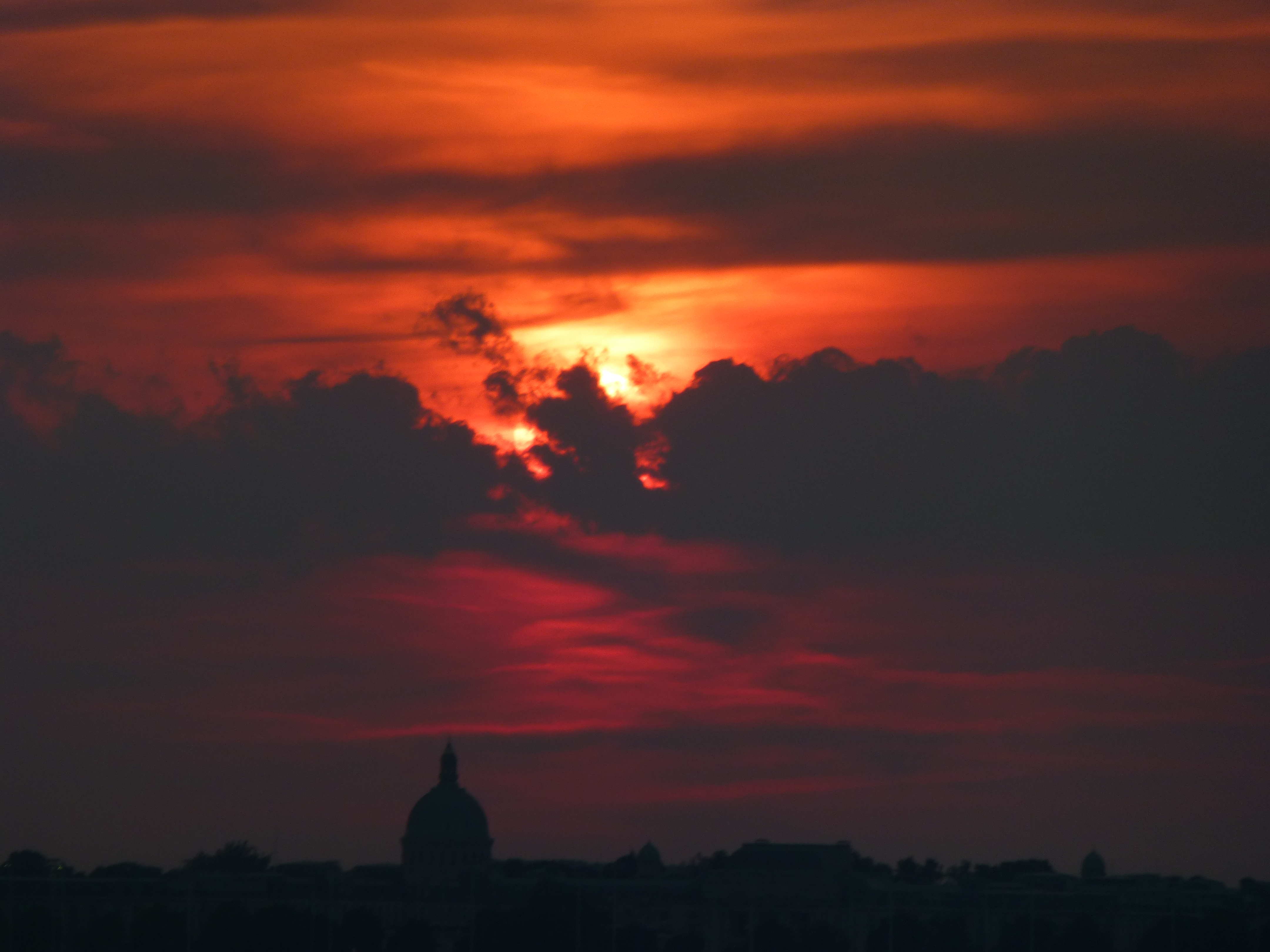Raging red cloudy sunset over the USNA Chapel Dome