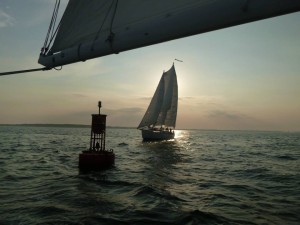 Woodwind rounds the windward mark first.