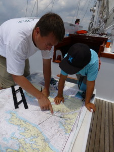 Frank teaching Hayden how to navigate the Woodwind on the 11:00 cruise.