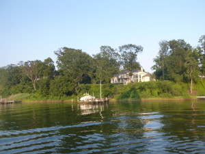 Motoring up Weems Creek, notice the shadow on land of our sail plan.