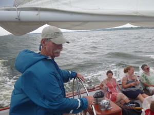 Don sailing Woowind II with a single reefed main and jib