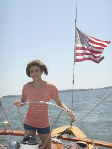 Makayla at the wheel of the 74' Schooner Woodwind