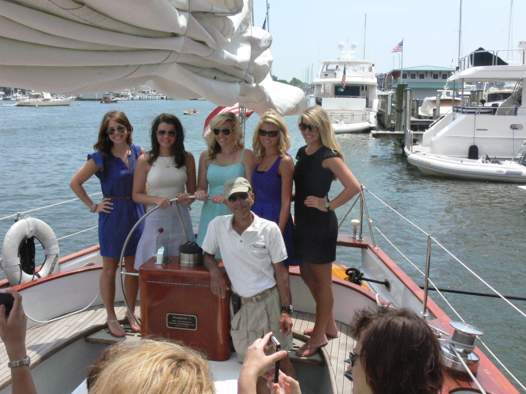 Watermelon Queens Carol, Catherine, Amber, Chelsey and Brandi pose in front of Captain Ken.
