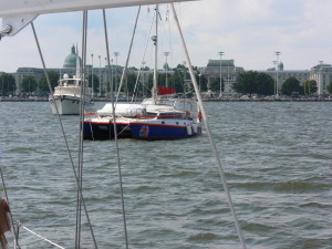 This cruising catamaran is at anchor.