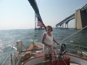 Michelle at the wheel of the schooner Woodwind II