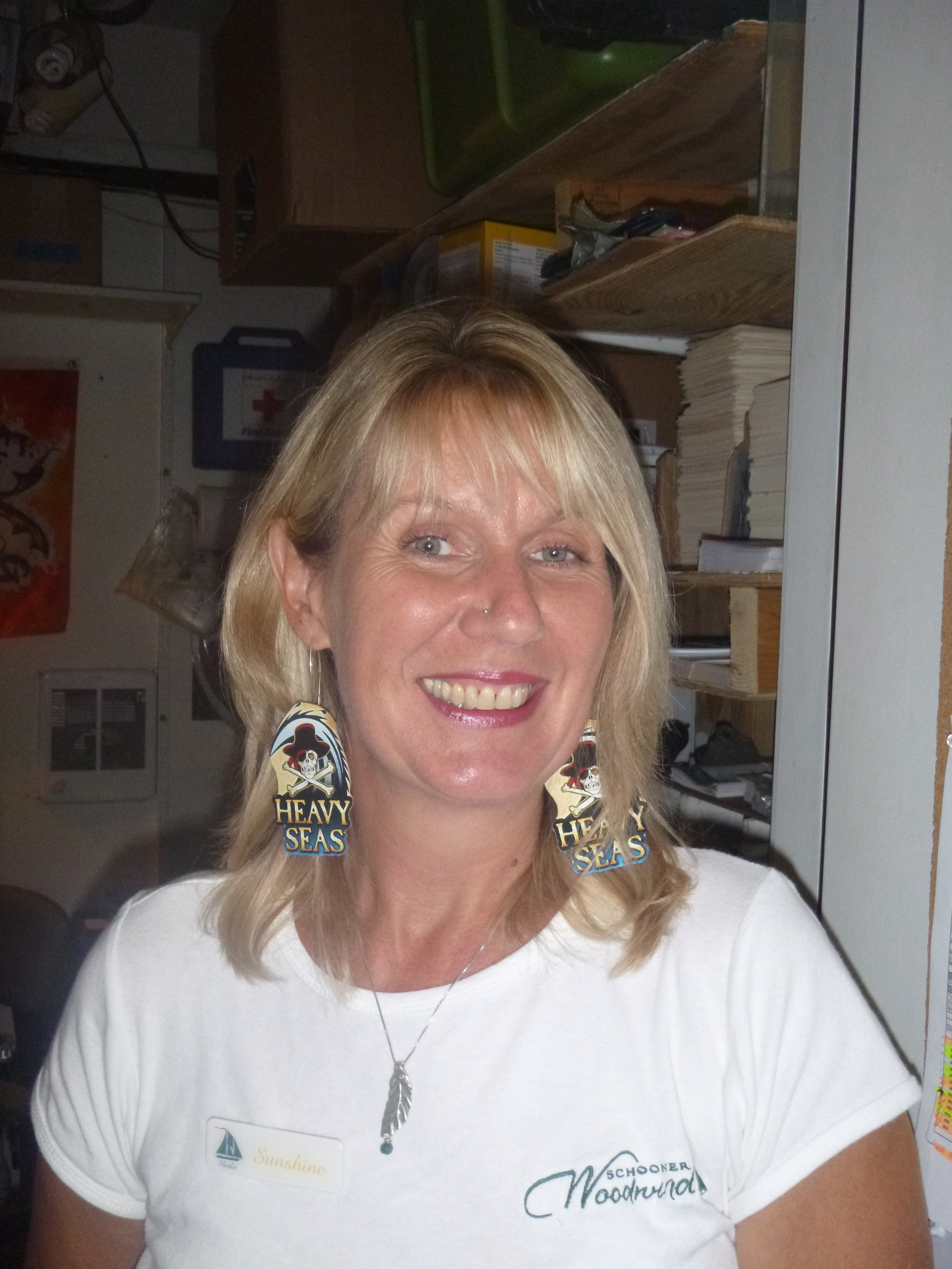 Sheila from customer service sporting her custom Heavy Seas earrings!!
