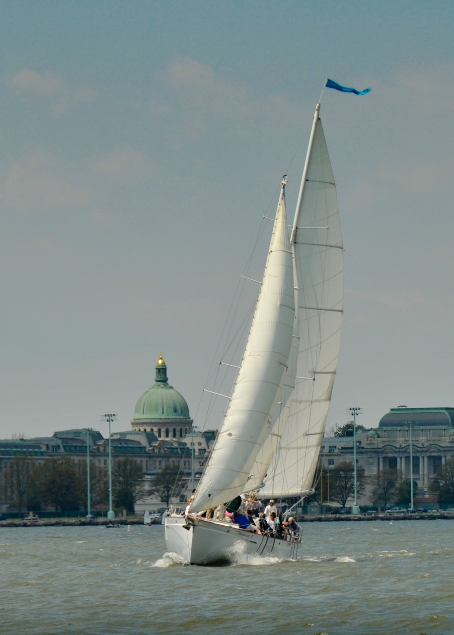 Schooner under sail with USNA Chapel Dome in back ground