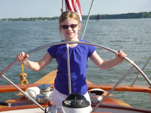 Capt. Rachel at the wheel of the Schooner Woodwind