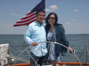 Zhen and Danielle at the wheel of Schooner Woodwind