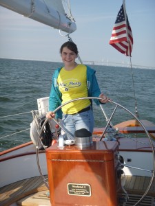 Makaela on station at the helm of Woodwind II