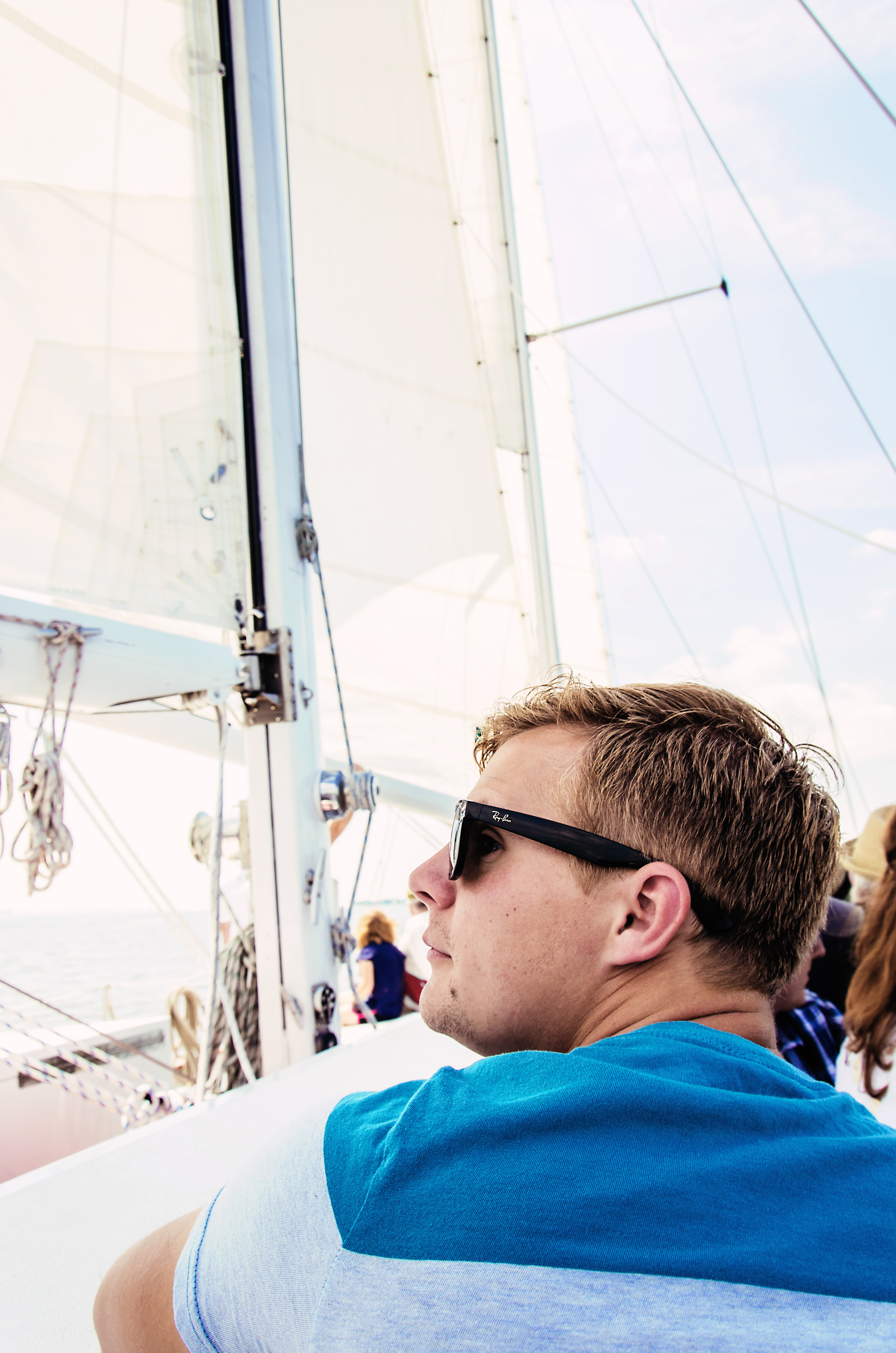Man in sunglasses enjoying his sail
