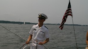 Plebe at helm