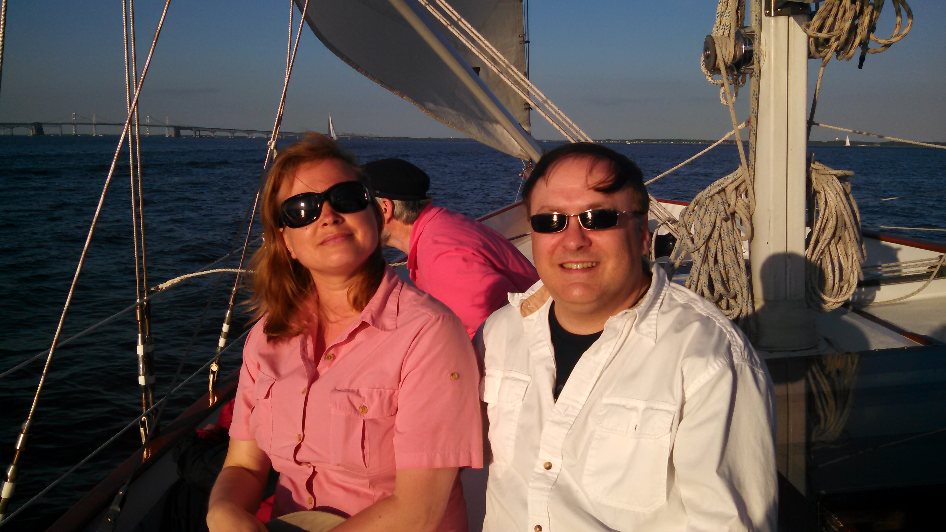 Happy guests aboard the schooner sailing on a sunny day