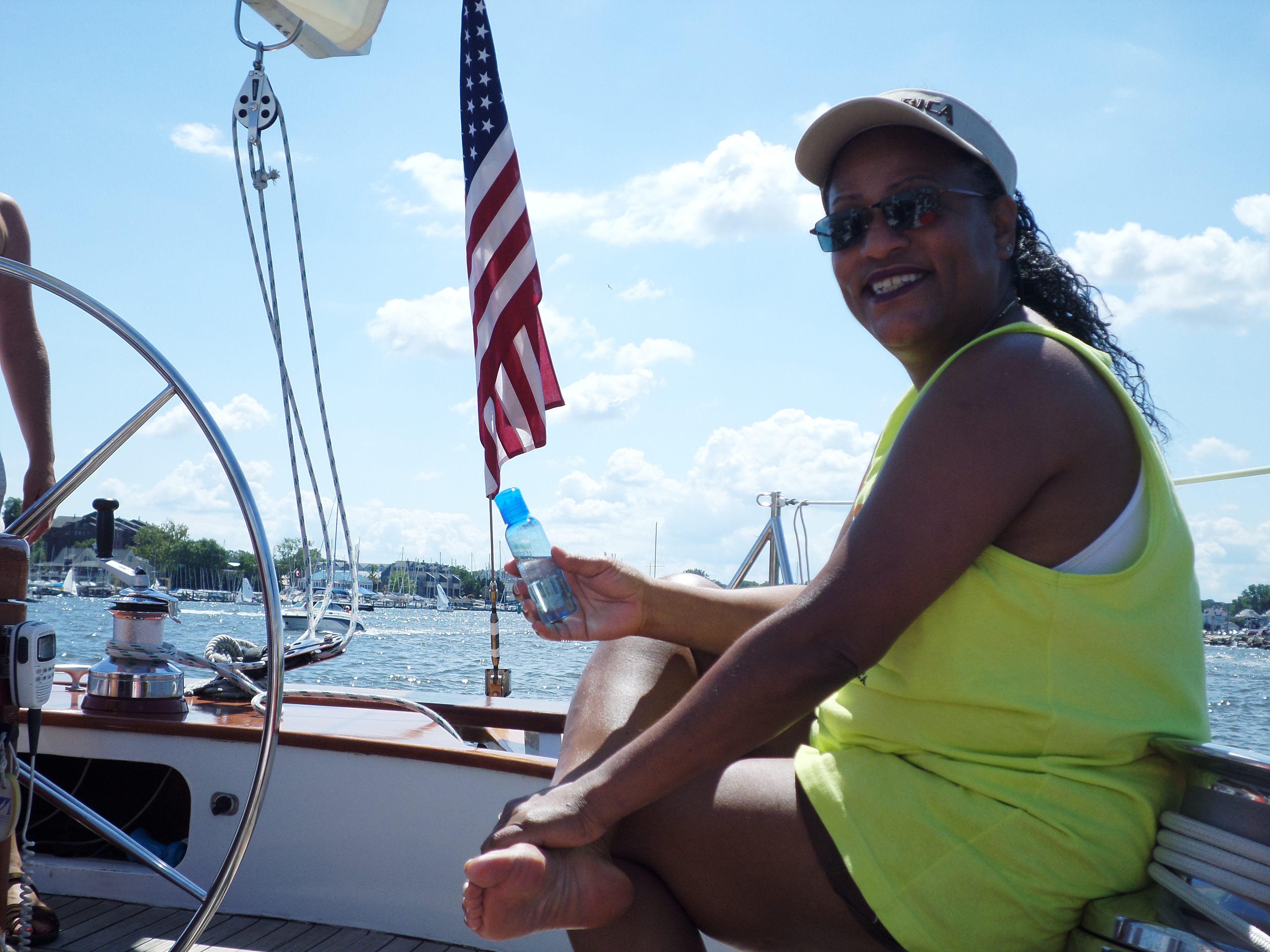 Women smiling on the schooner on a sunny day