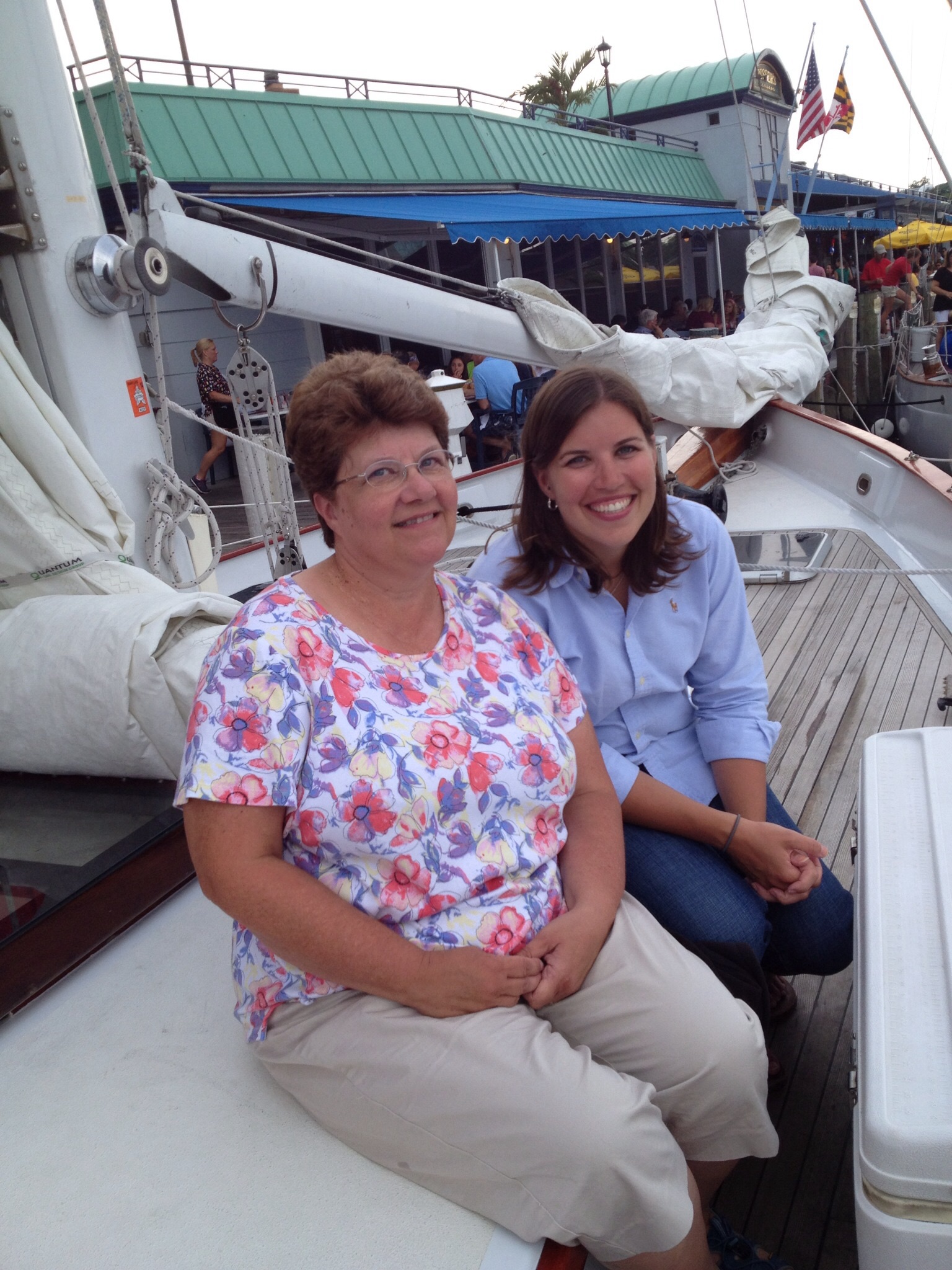 Two ladies smiling just getting ready for their sail on the schooner