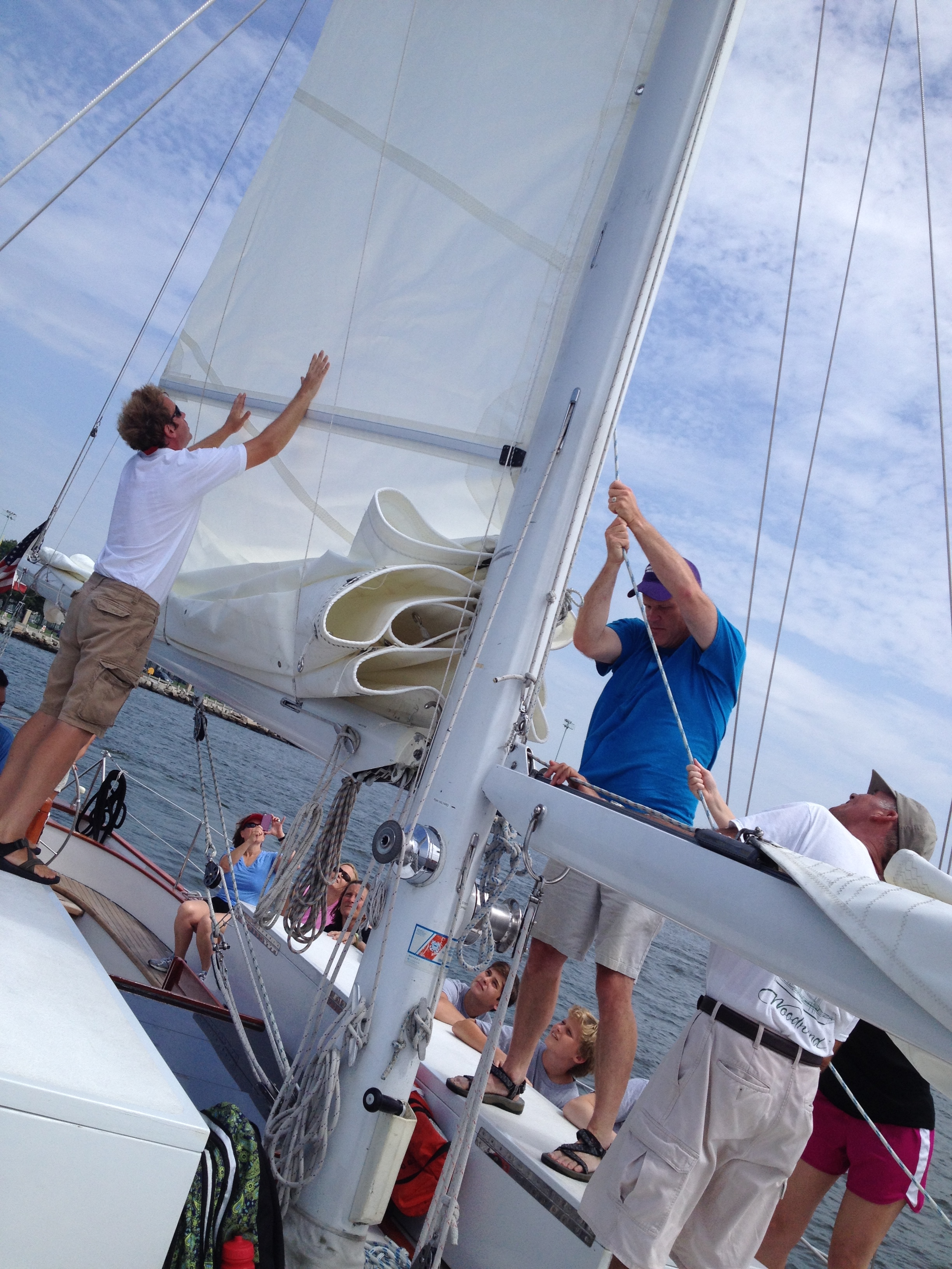 Guests giving a hand with the sails