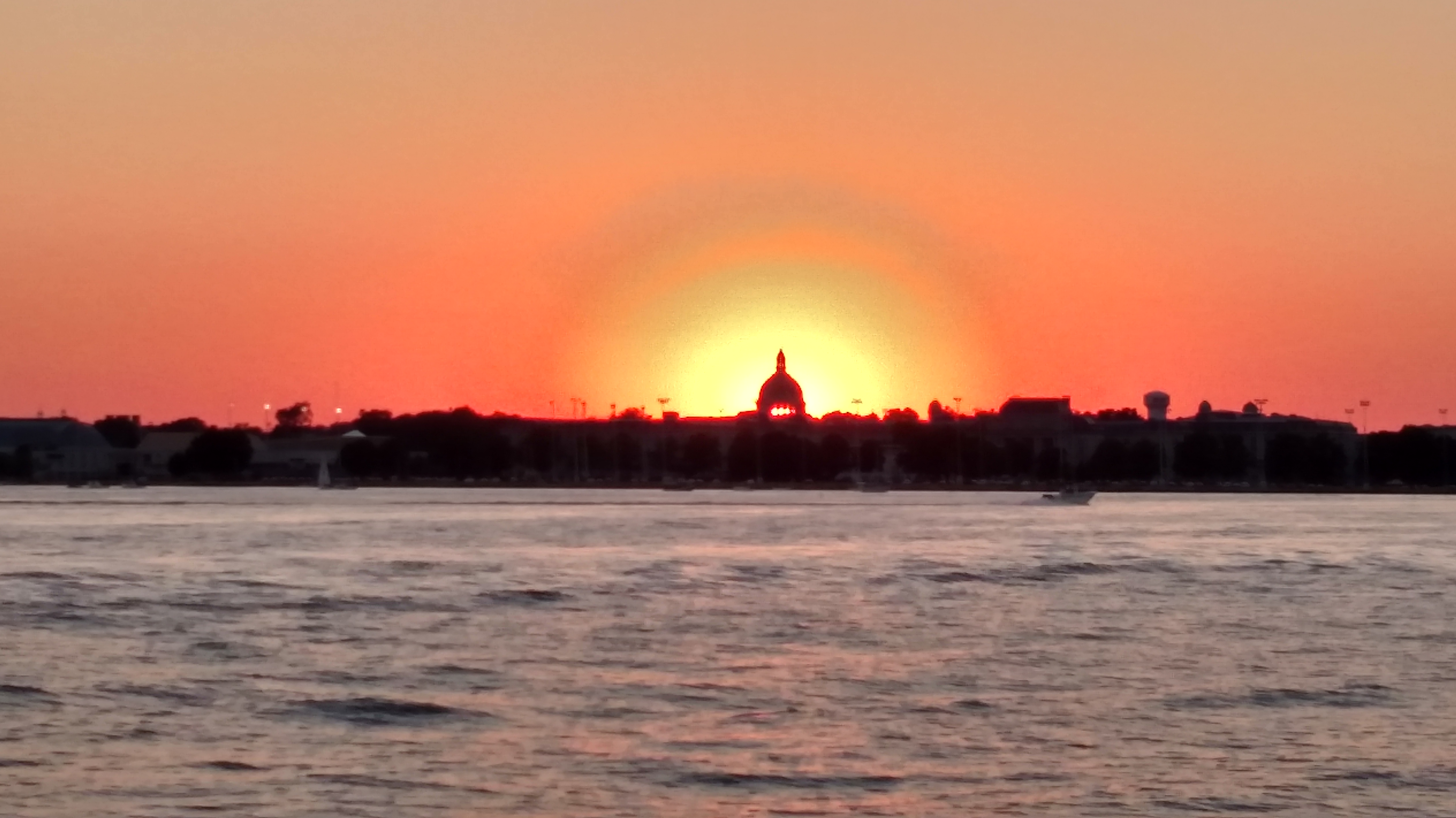 Sunset glowing around the USNA Chapel Dome taken from the water