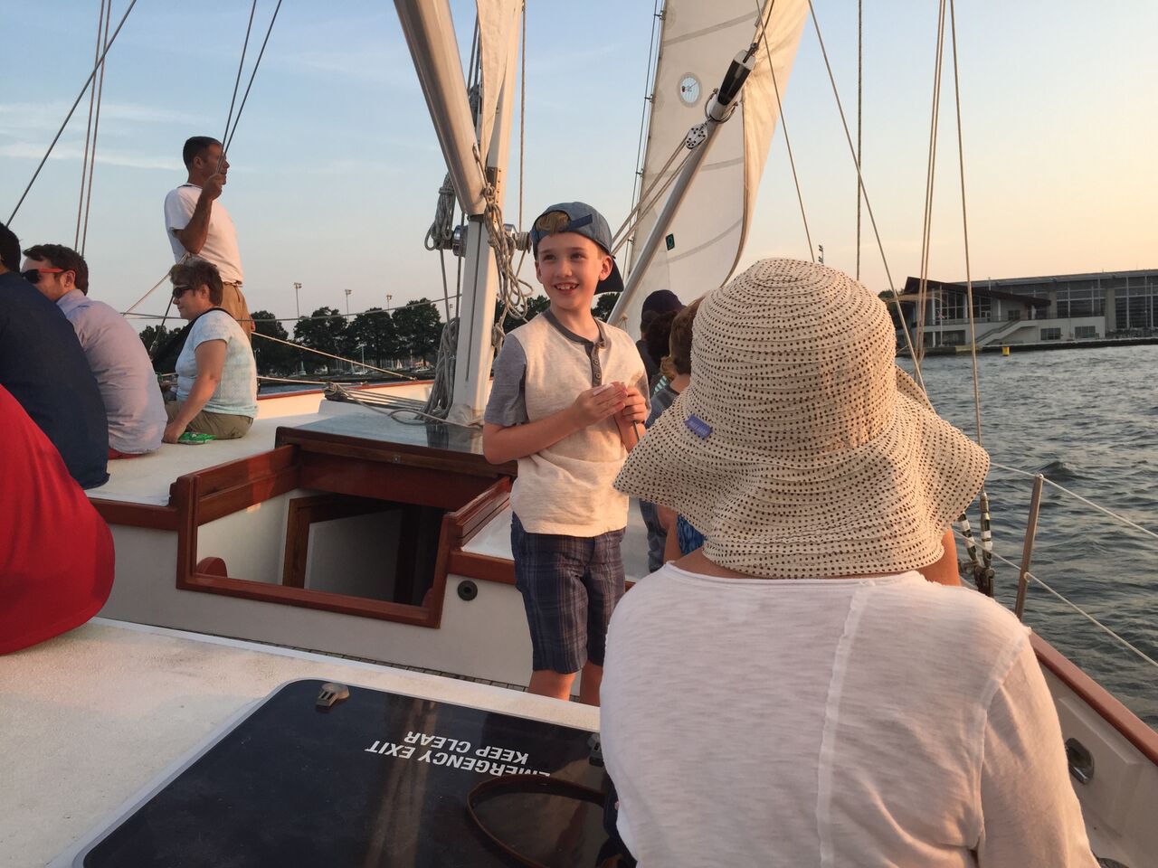 Little boy smiling and enjoying his sail on the schooner