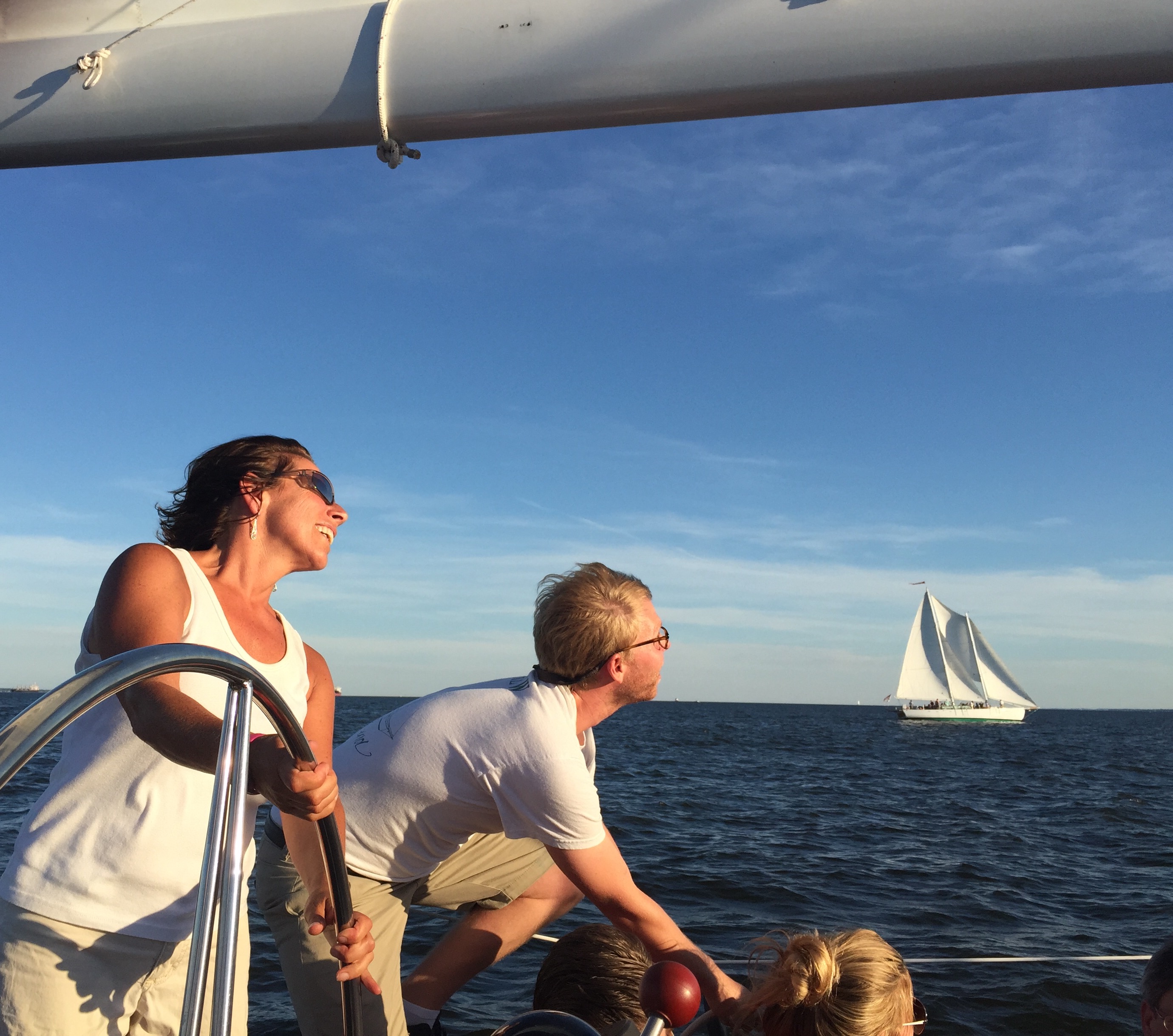 Taking a picture from one schooner to another on a sunny sail day