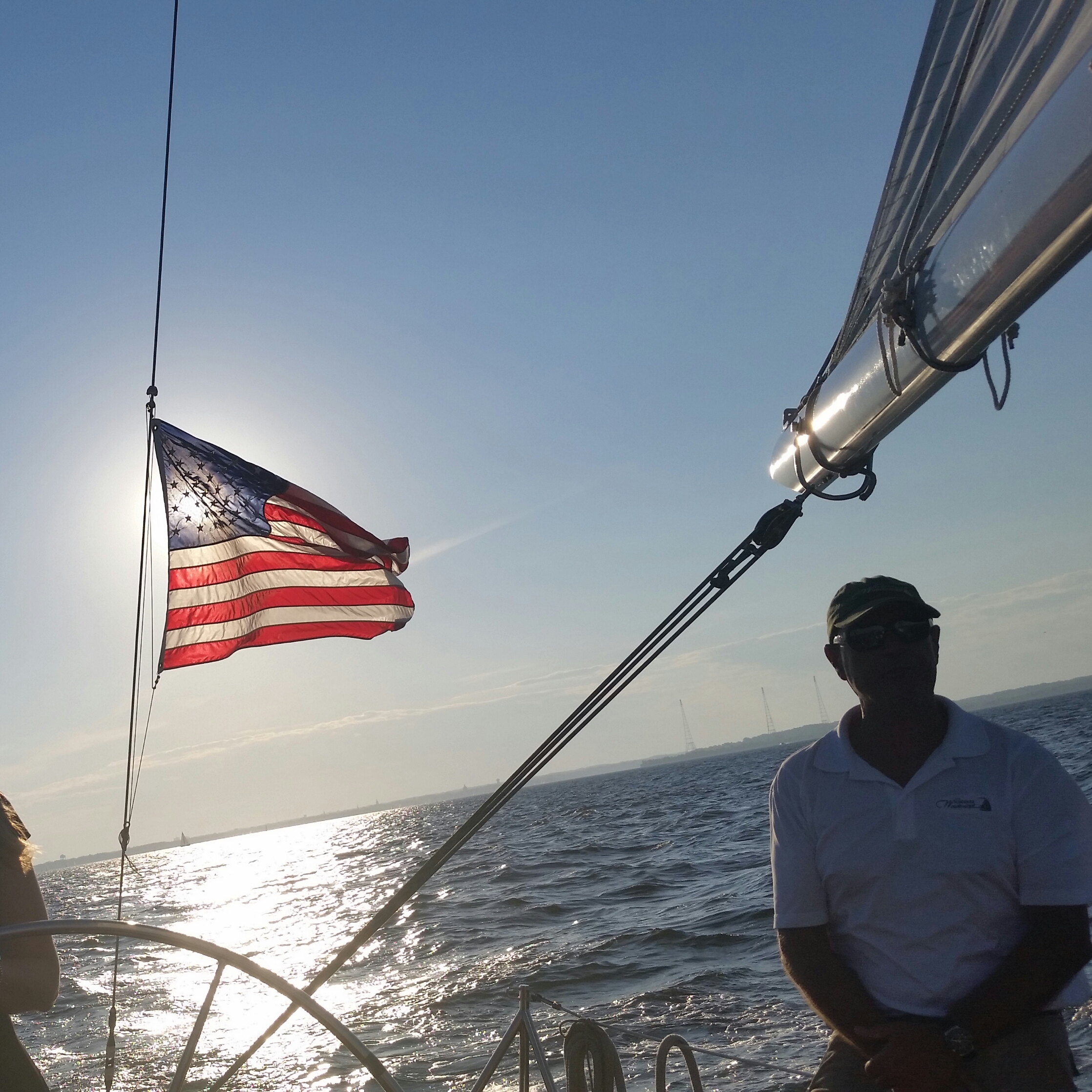 Captain taking a break and letting one of our guests sail