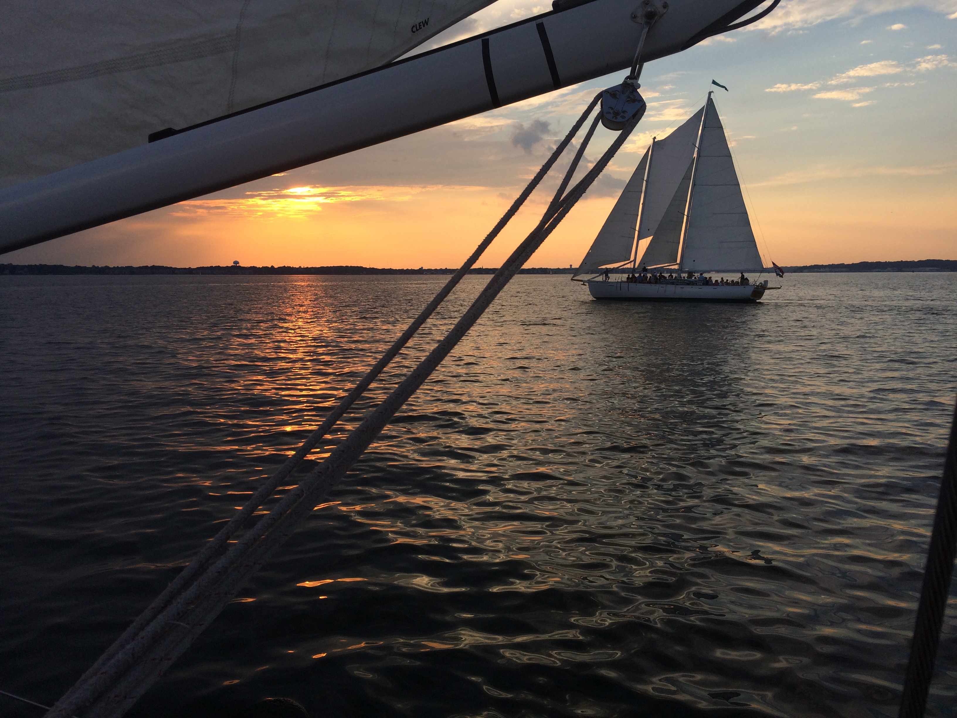 Picture taken from under the jib of one schooner of other schooner sailing