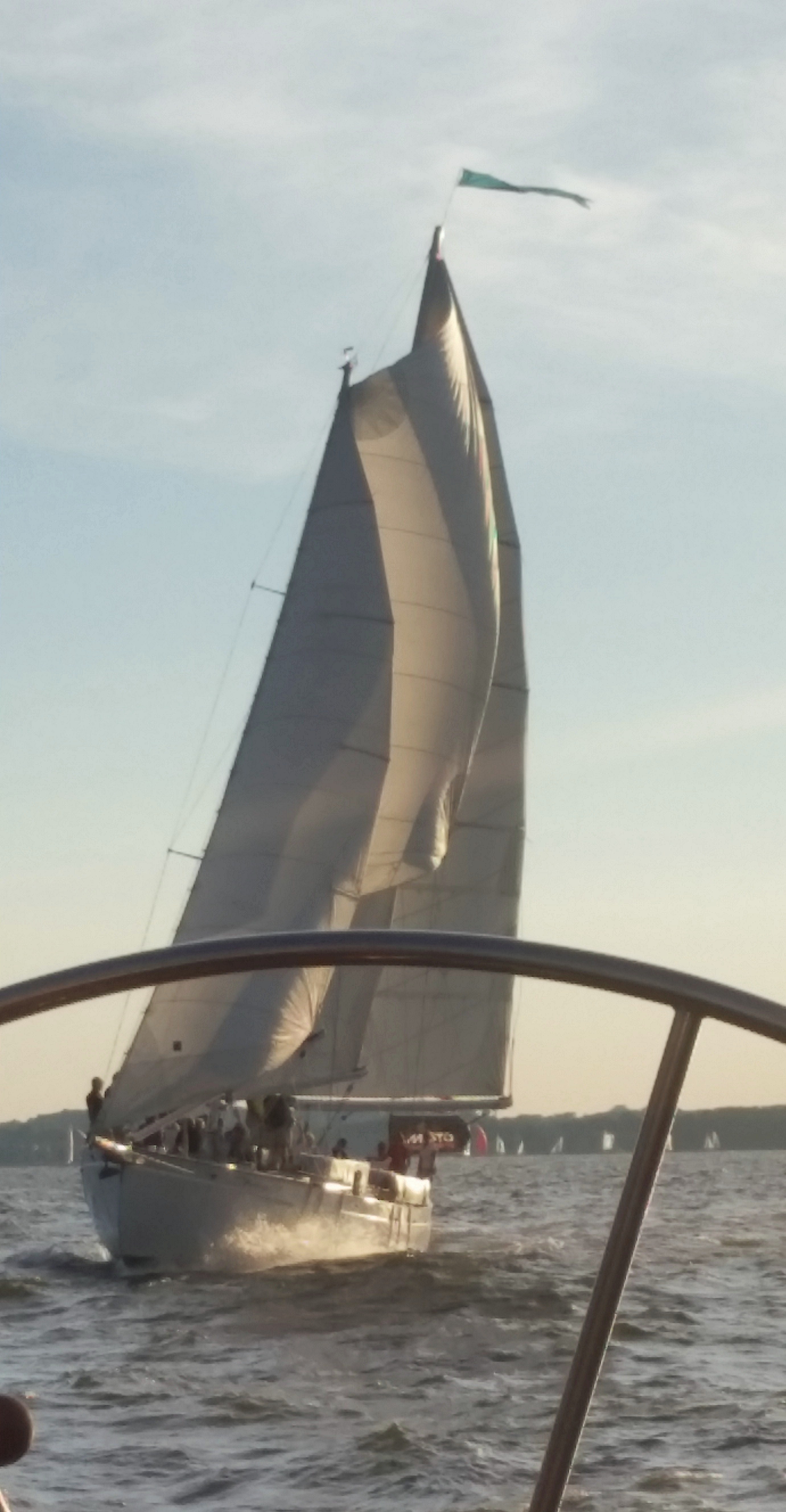 Peering through the schooner steering wheel at 2nd schooner