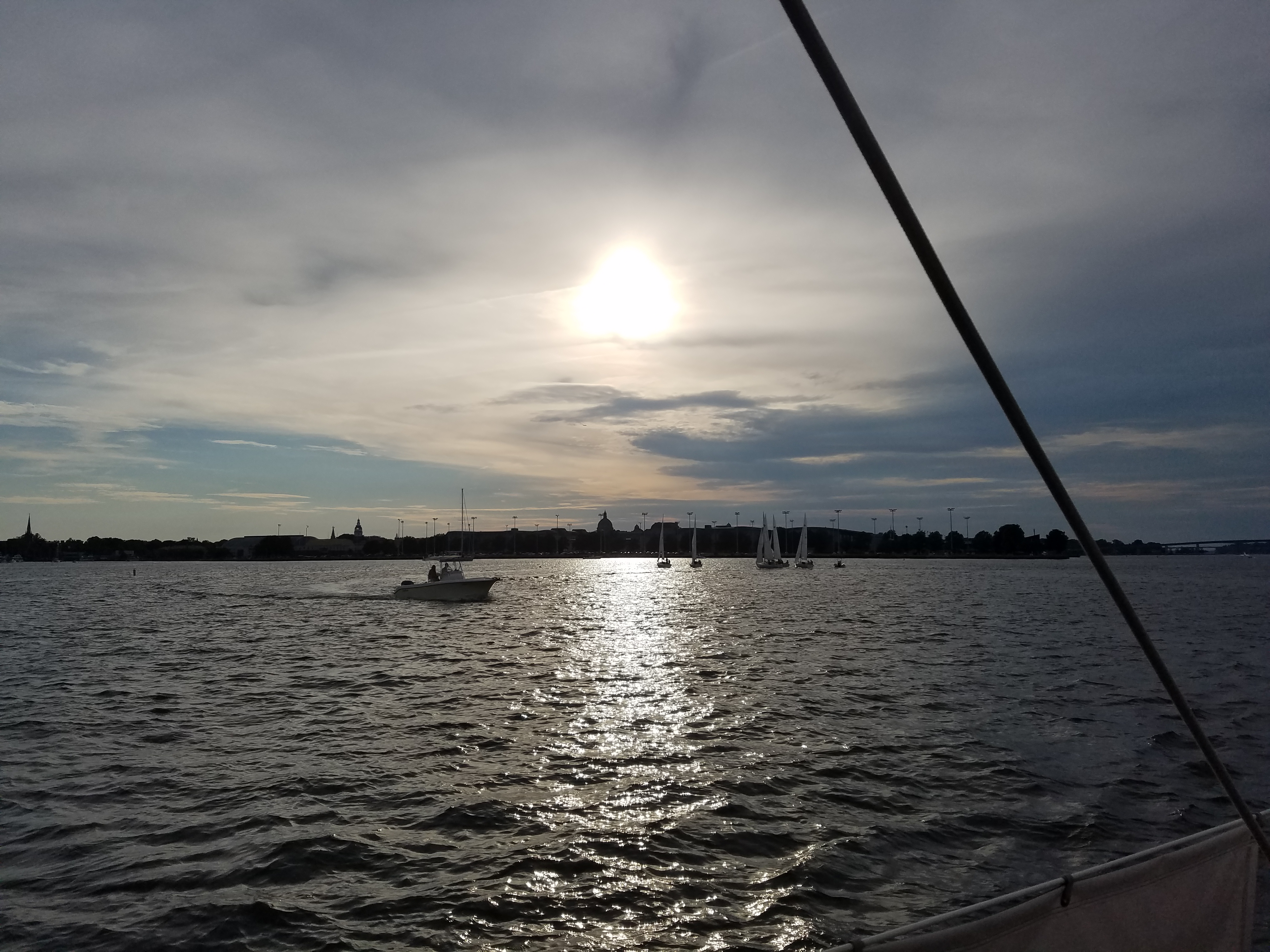 Dark waters and bright sun reflecting on them over Annapolis