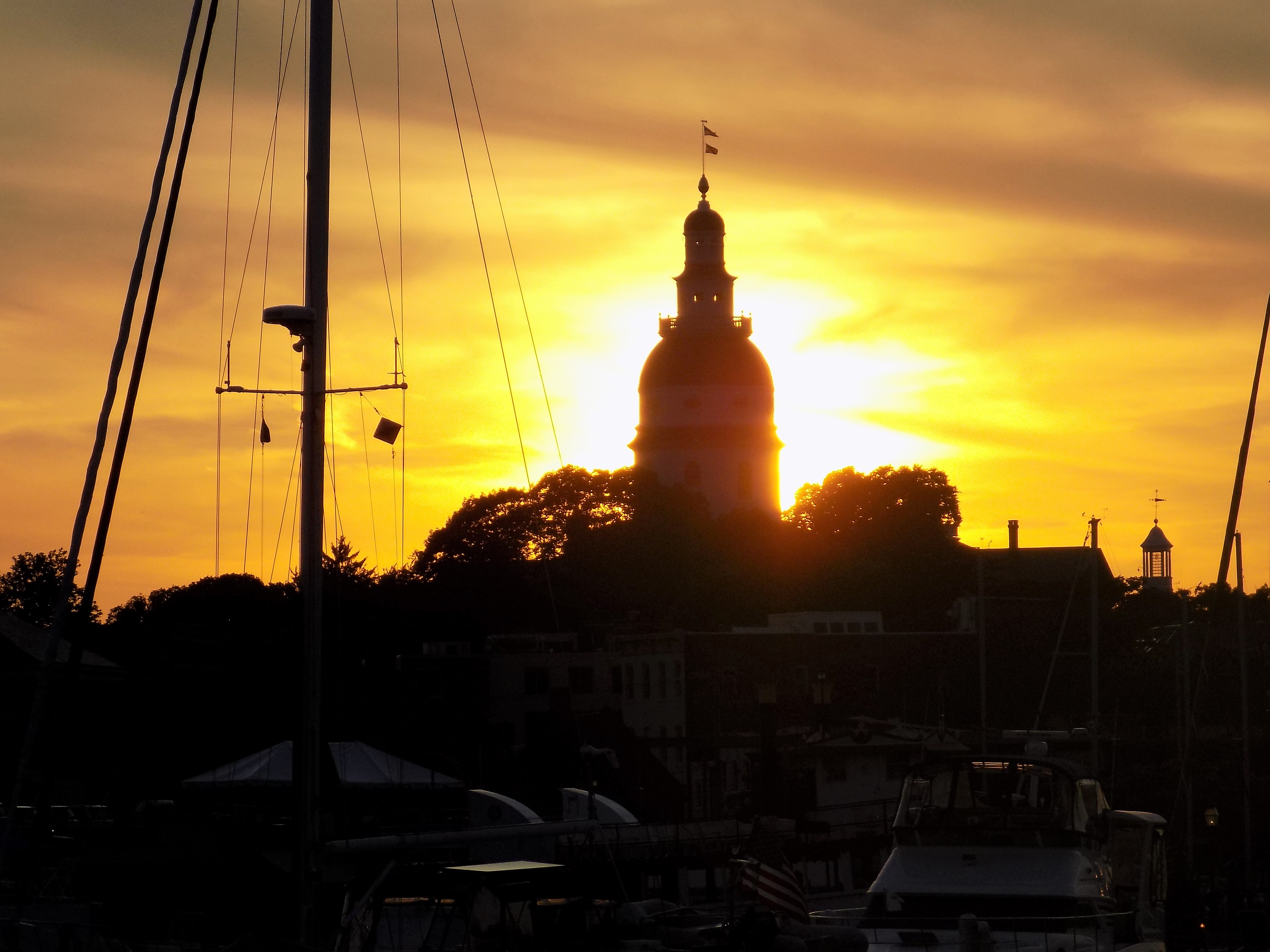 Brilliant yellow sunset framing the Annapolis Capital building