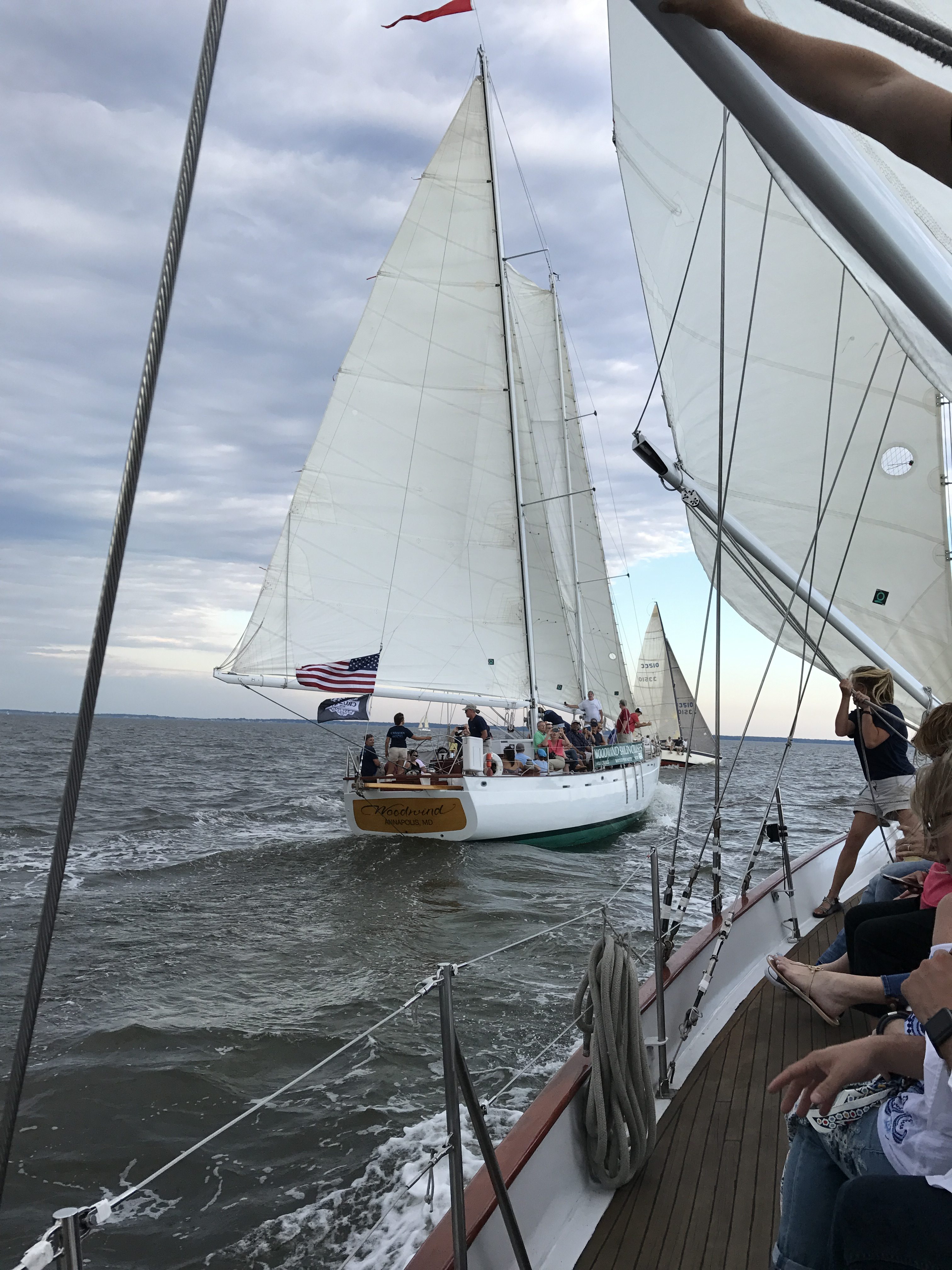 One Schooner catching up to the other schooner on a very windy day