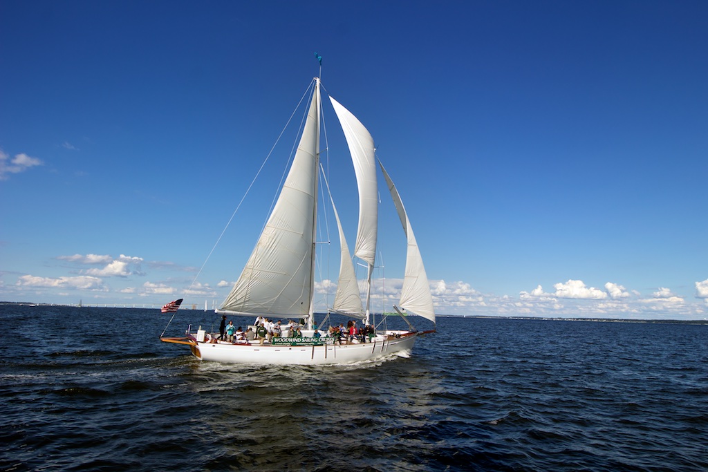 Schooner under full sail on a blue and windy day