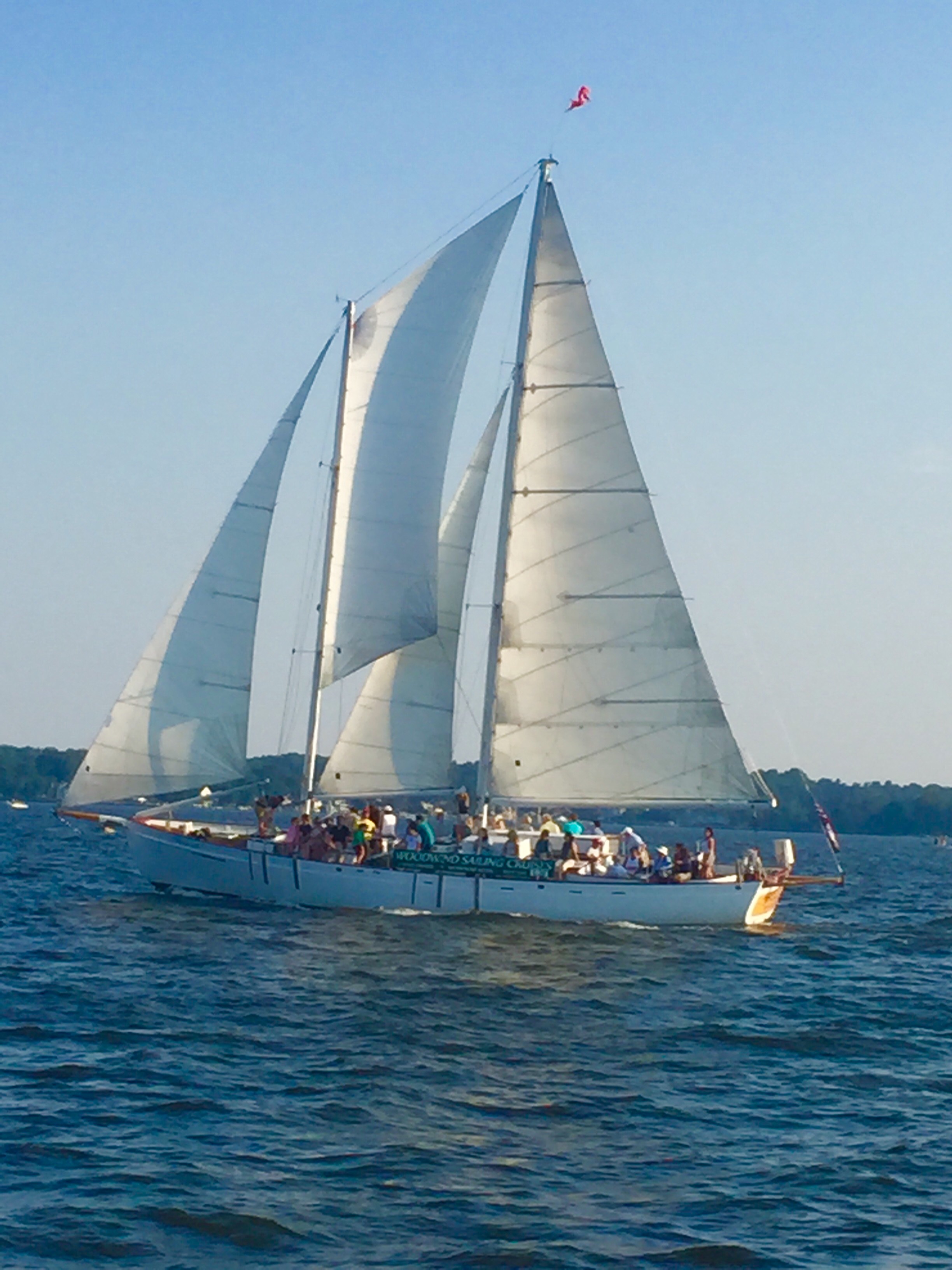 Sailing under full sails with many guests on board