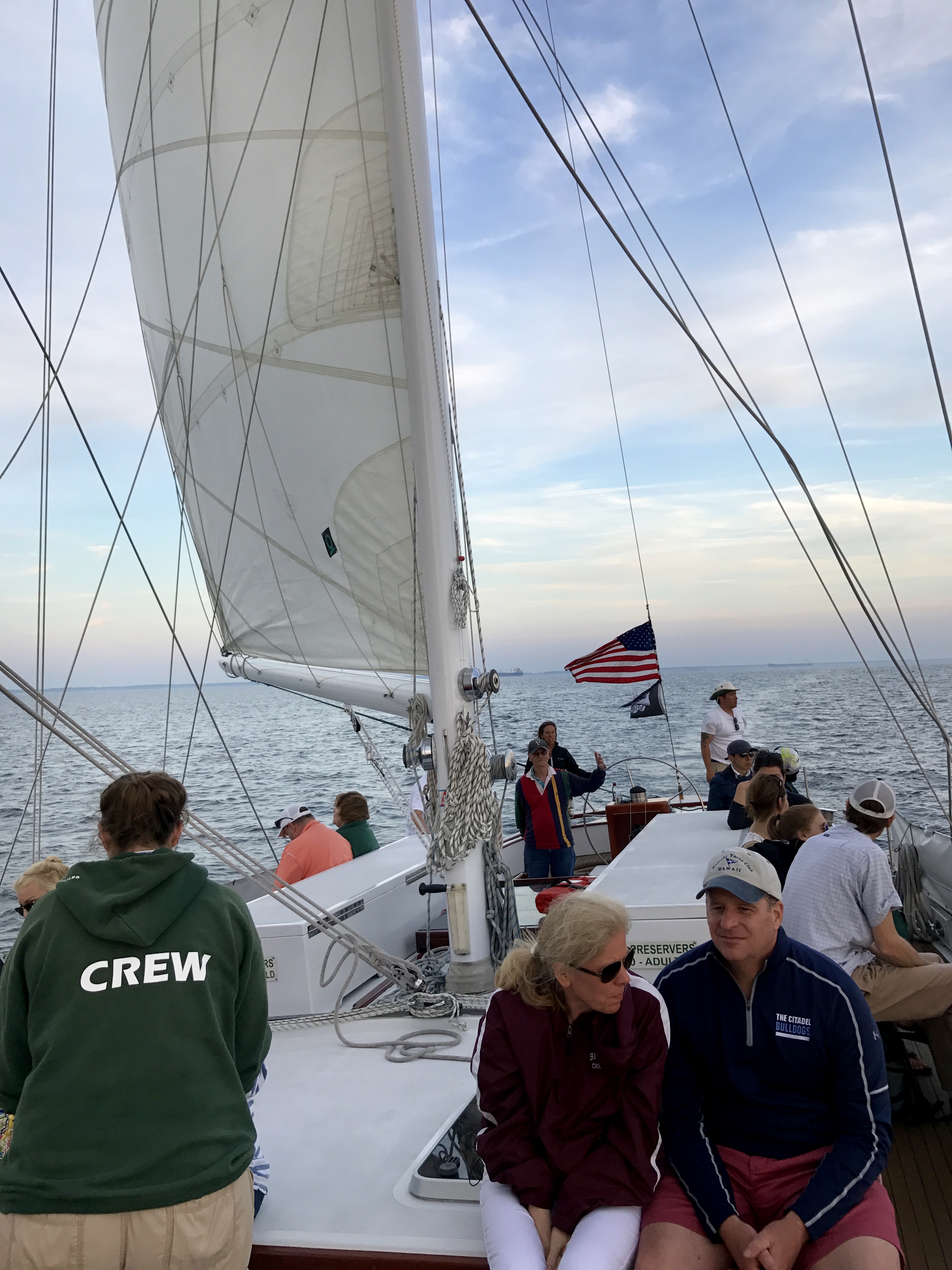 Guests and crew aboard the schooner on a windy day