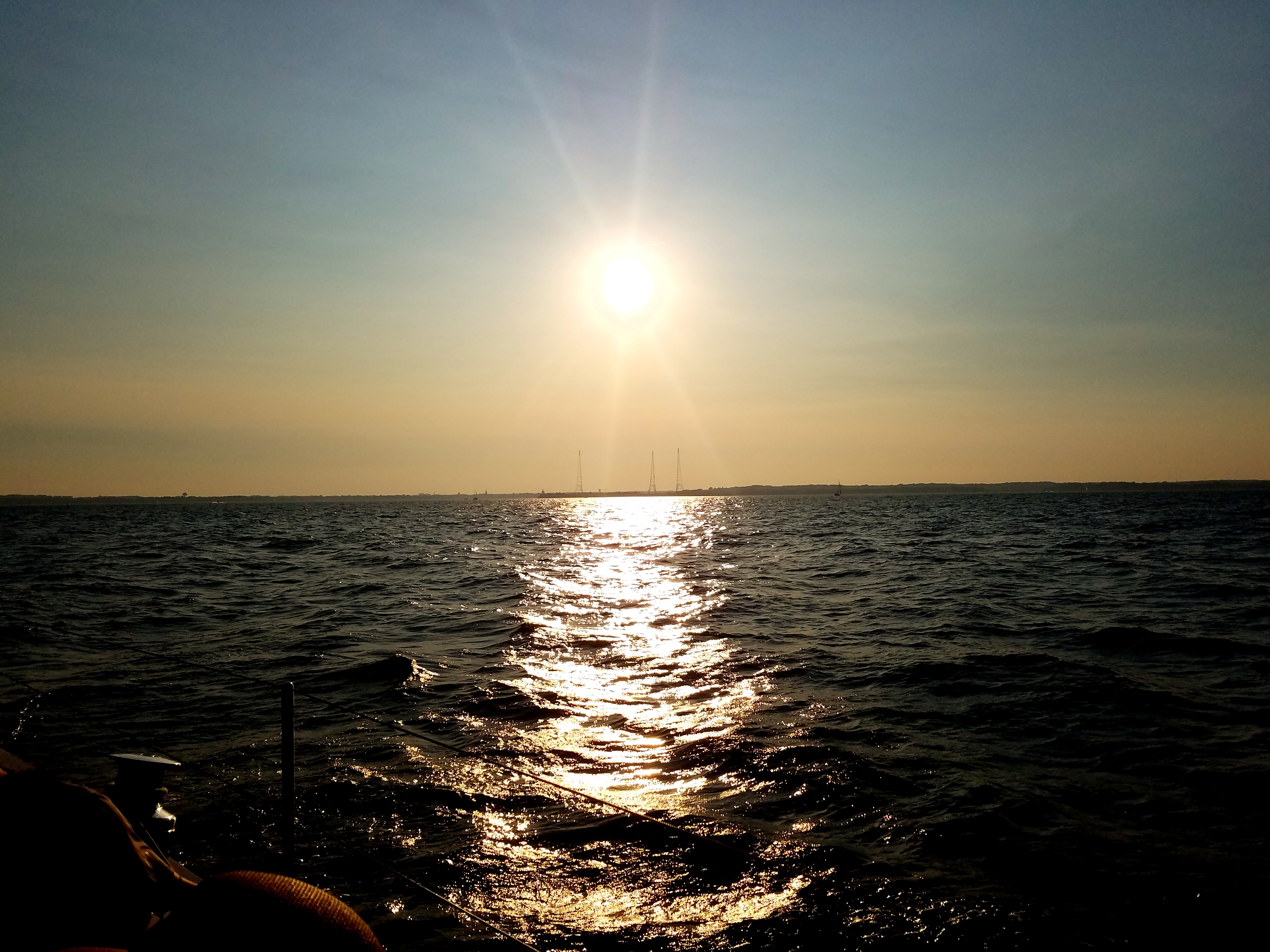 Sunset reflecting on dark blue waves of the Chesapeake Bay