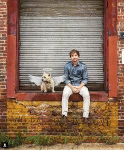 Chris Diller and dog with halo and angel wings