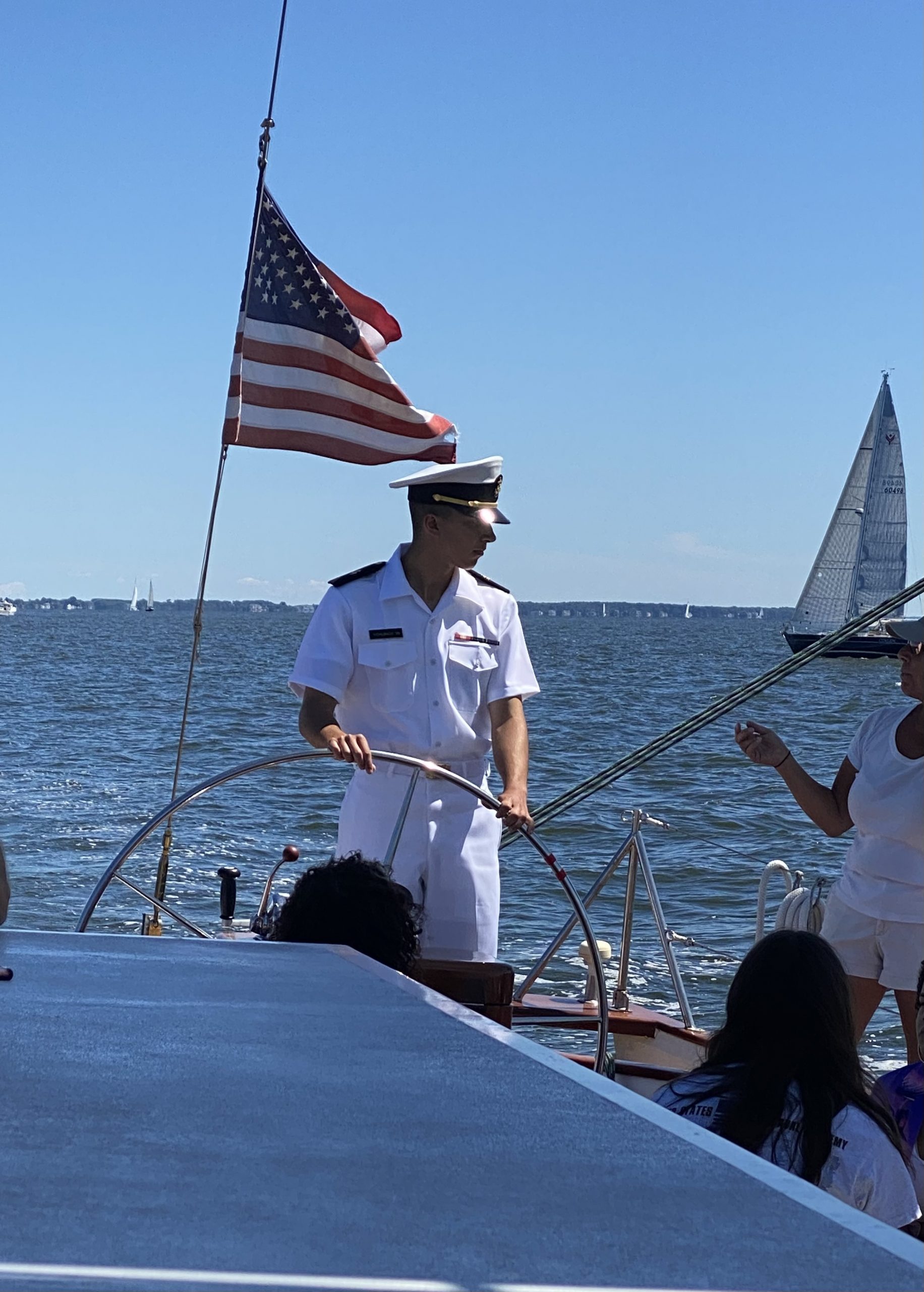 Midshipman at the helm of Woodwind